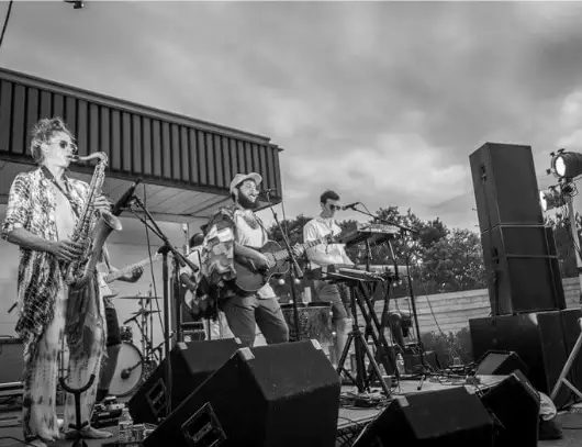 band performing at shop