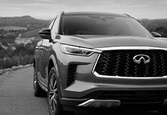 Black and white photo of Infiniti SUV